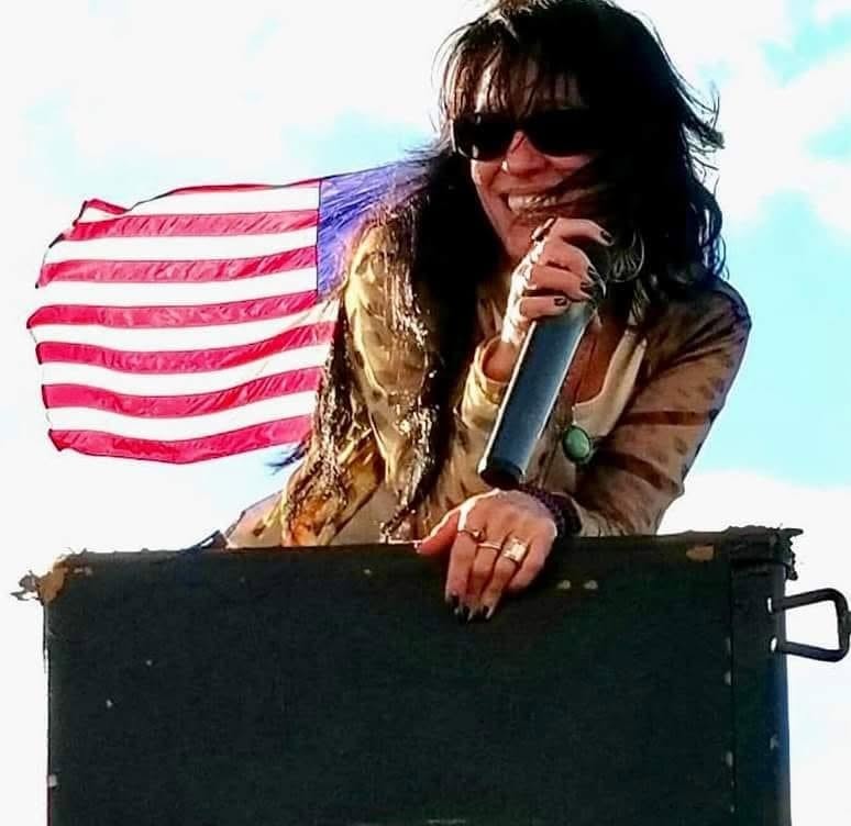 Angie Campbell rock star with microphone