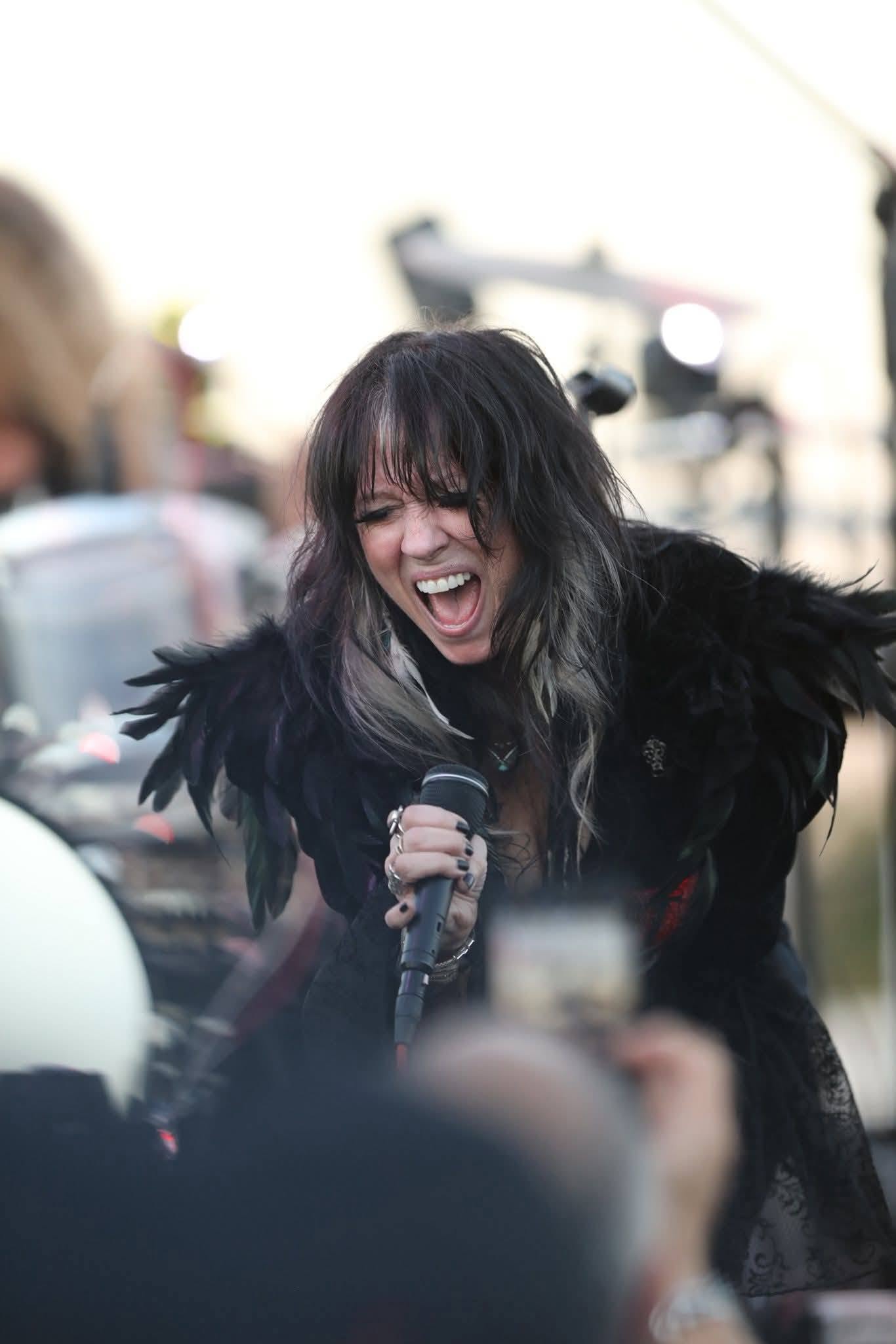 Angie Campbell performing live on stage
